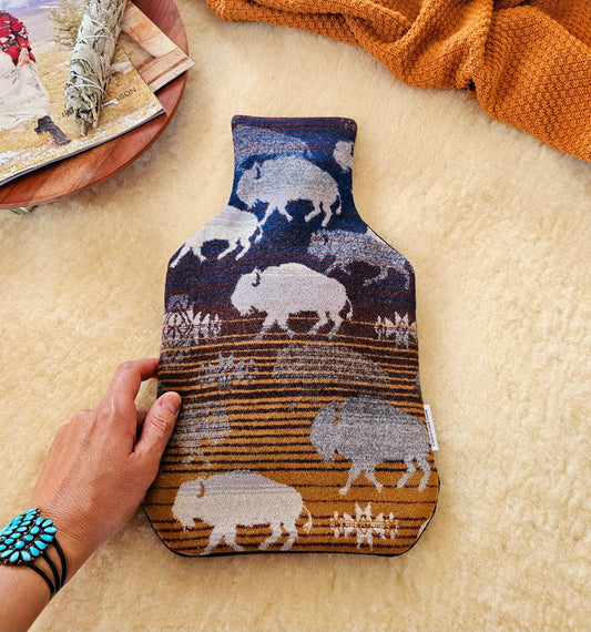 Land of the buffalo print wool hot water bottle cover, featuring navy, brown & camel background with grey buffalo and star designs.